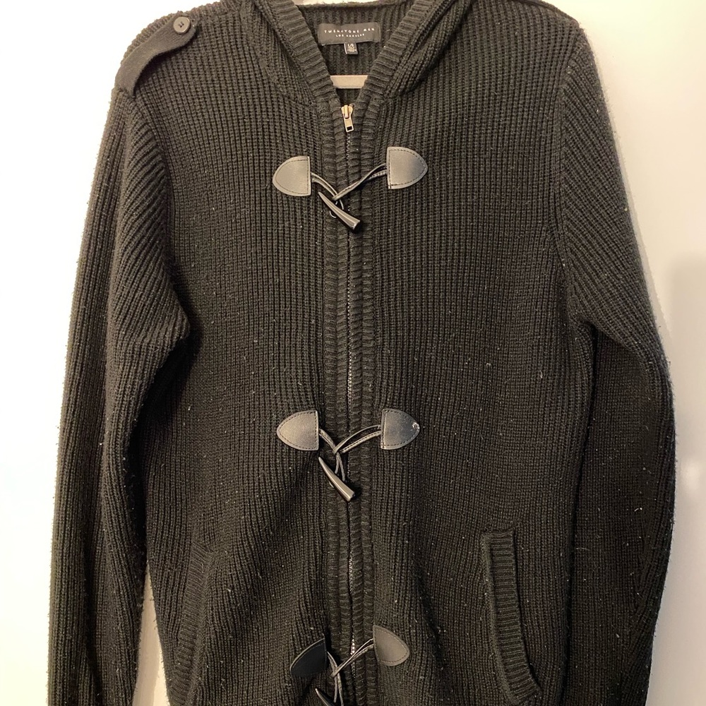 Makes black sweater